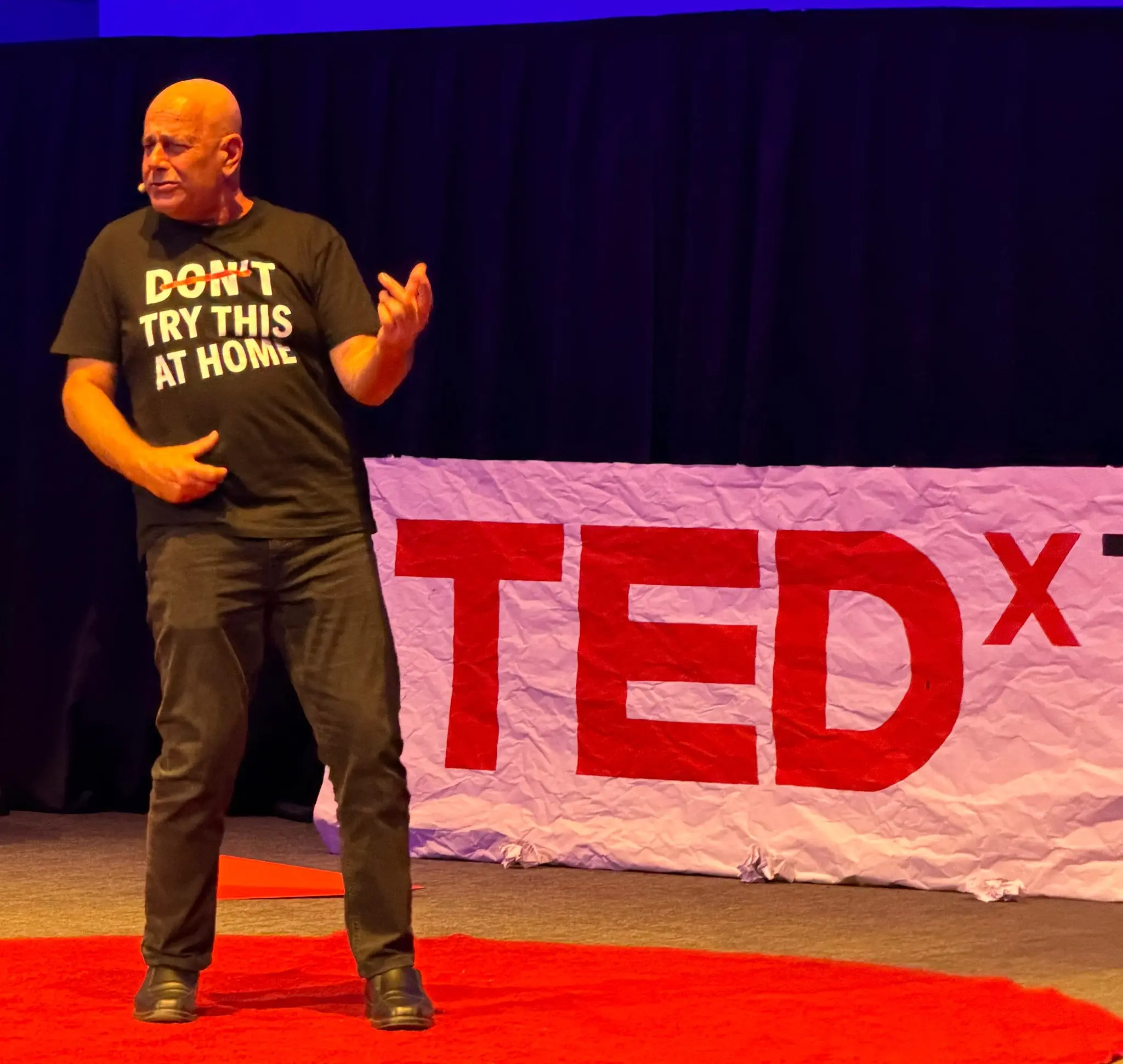 Shmulik speaking at TEDx event